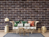 Brown stone effect wallpaper in home office with wooden furniture