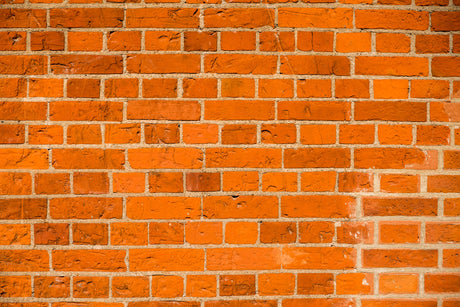 Design file of orange terracotta brick wallpaper showing detailed texture and mortar lines