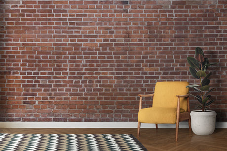 Brick effect wallpaper in modern living room showing natural red clay tones and realistic texture