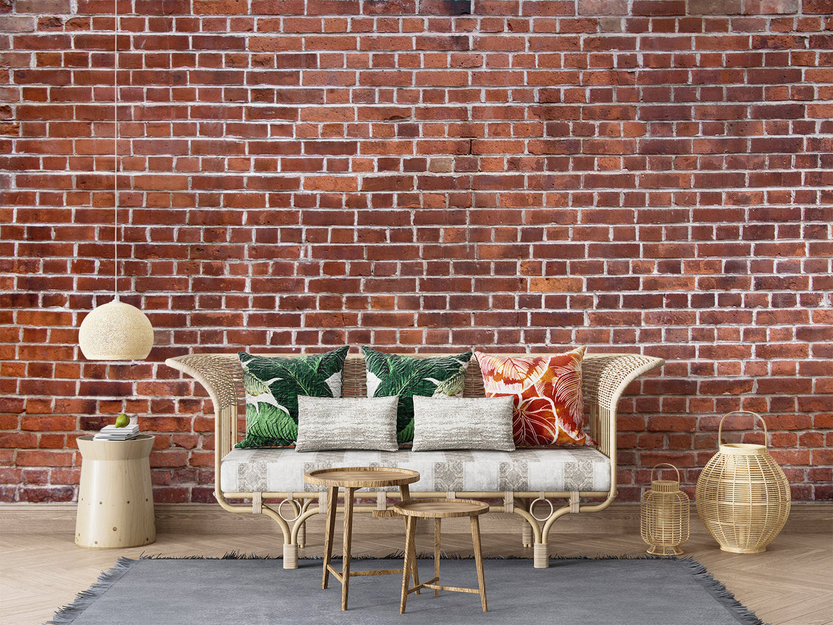 Rustic brick wall mural adding warmth to a minimalist dining space with pendant lighting