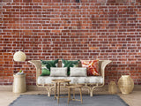 Rustic brick wall mural adding warmth to a minimalist dining space with pendant lighting