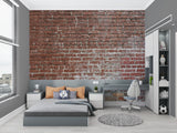 Red brick mural wallpaper in bedroom showing textured detail