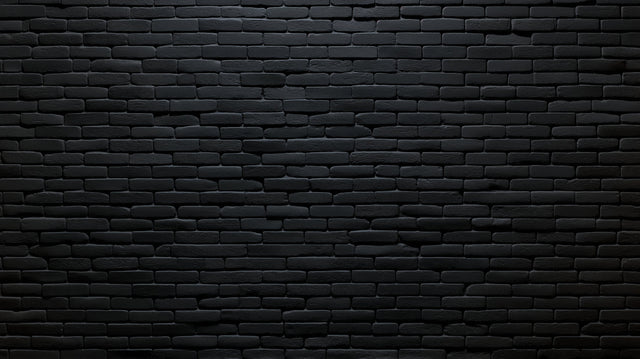 Black brick wallpaper in modern living room with leather sofa and metal lighting fixtures