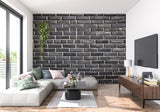 Modern brick wallpaper design in industrial kitchen highlighting contrast with white cabinets