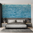 Modern blue brick wallpaper in a minimalist living room creating an urban industrial atmosphere