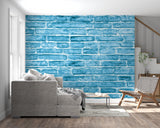 Industrial brick wallpaper featuring blue tones in a contemporary bedroom setting