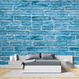 Blue industrial brick pattern creating a statement wall in a dining room