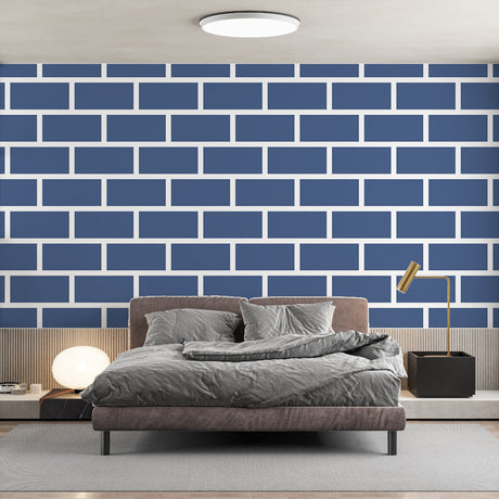 Modern blue brick pattern wallpaper in a bright living room with minimal furniture and large windows