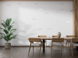 Grey brick wall mural creating depth in a minimalist dining room
