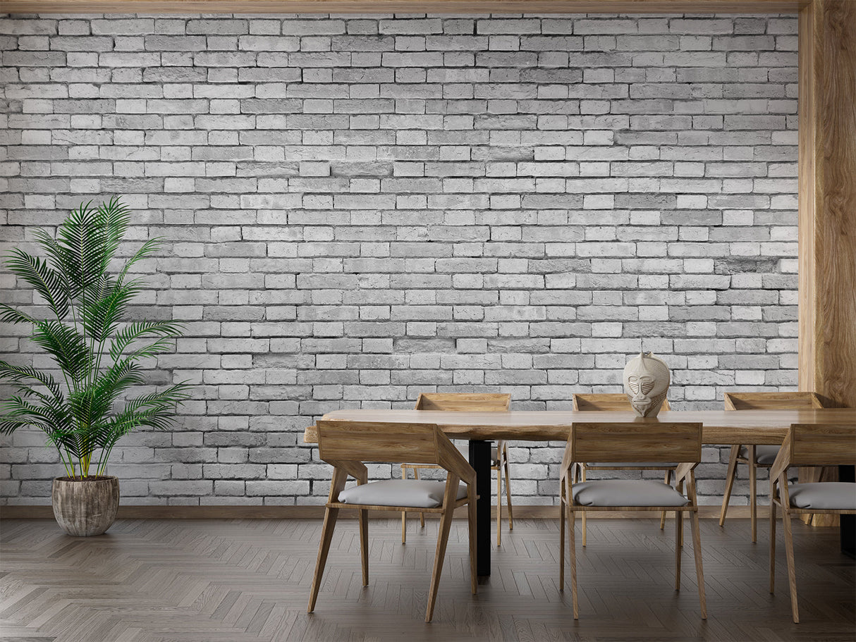 Grey brick wallpaper creating industrial atmosphere in modern living room with leather sofa