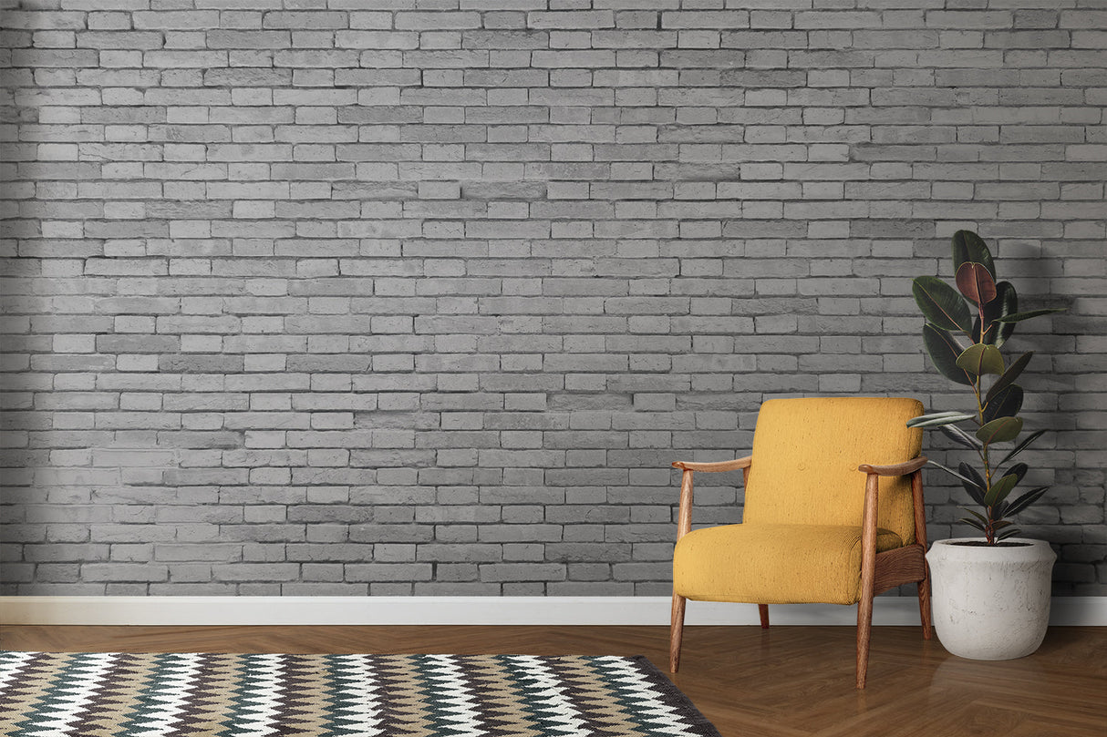 Grey brick mural wallpaper adding texture to contemporary dining room