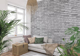 Industrial stone mural creating statement wall in restaurant interior
