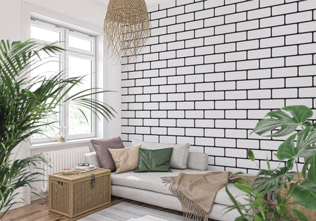 Modern black and white brick wallpaper in a bright contemporary living room with minimalist furniture