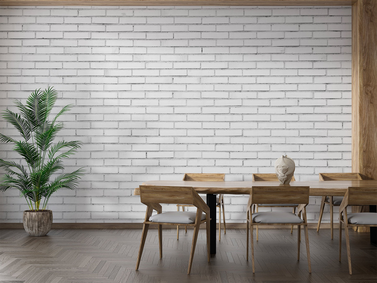 Modern white brick wallpaper in bright living room with grey sofa and natural light