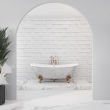 Modern white brick arch wallpaper in a bright living room with minimal furniture and large windows