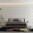 Modern white brick wallpaper in a bright minimalist living room showing clean lines and urban style