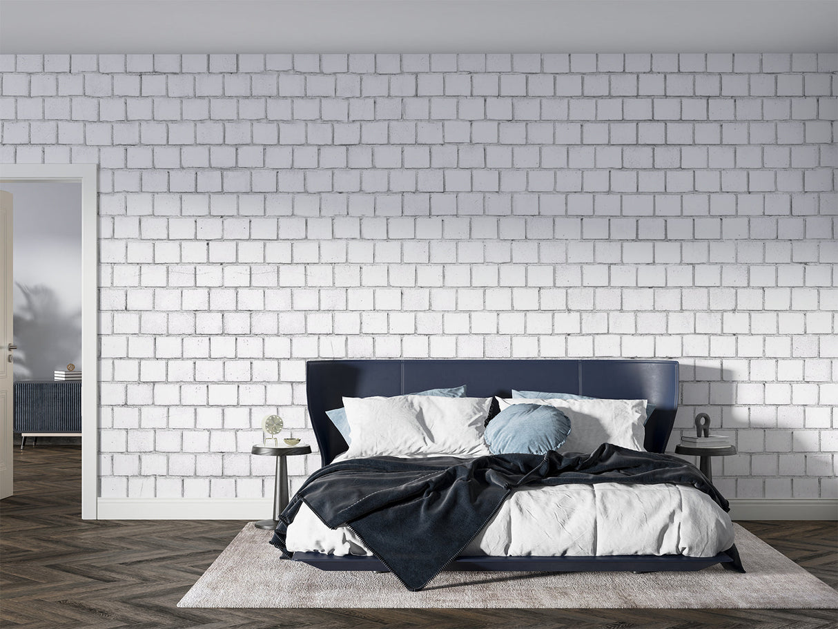 Home office space with modern white brick wall mural creating professional backdrop