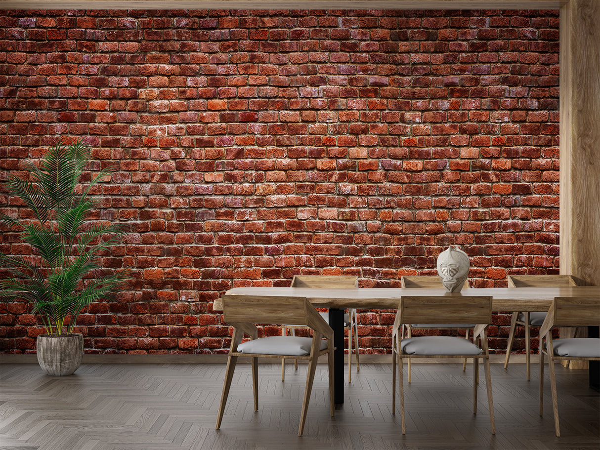 Brick effect wallpaper creating warmth in modern living room with grey sofa and plants