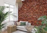 Terracotta brick wallpaper in loft-style bedroom with urban decor elements