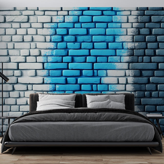 Blue gradient brick wallpaper creating depth in a modern living room with grey sofa and minimalist decor