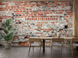 Brick wallpaper mural in modern living room showing authentic aged texture and industrial charm