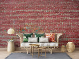 Industrial brick wall mural in kitchen with stainless steel appliances