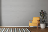 Modern office space featuring white brick wallpaper accent wall