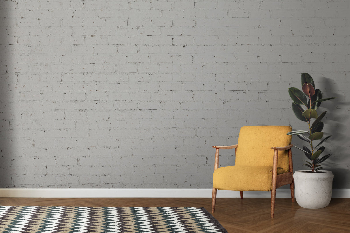 Brick effect wallpaper creating bright dining room feature wall