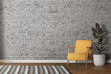 Textured brick mural adding depth to modern kitchen design
