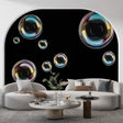 Bubble wall mural with iridescent spheres creating depth in a modern living room with ambient lighting