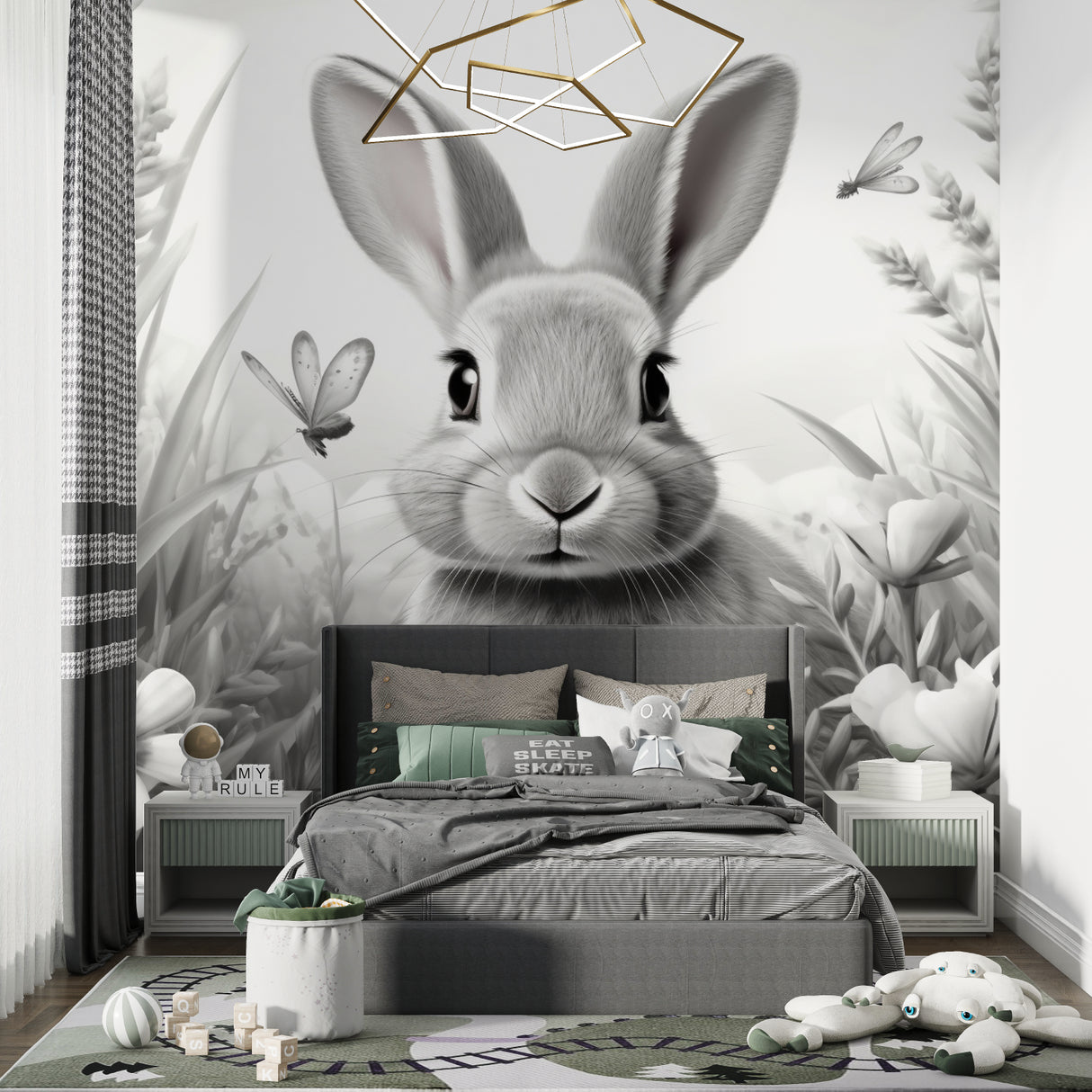 Black and white bunny wallpaper in modern nursery with white furniture
