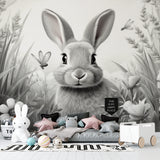 Enchanted garden bunny mural in child's reading nook with cozy pillows