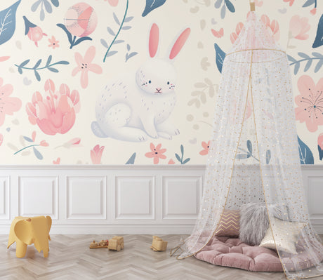 Bunny wallpaper in modern nursery with white furniture and pink accents