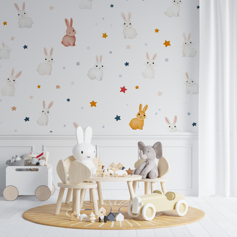 Bunny wallpaper creating a magical atmosphere in a modern nursery with soft lighting and star accents