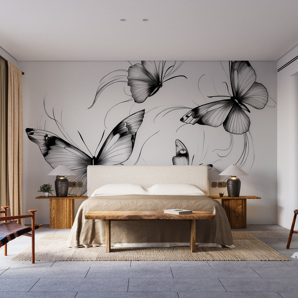 Black and white butterfly wall mural creating an artistic focal point in a minimalist living room setting
