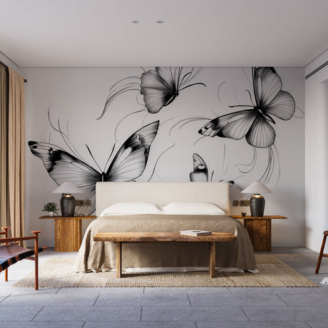 Black and white butterfly wall mural creating an artistic focal point in a minimalist living room setting
