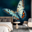 Butterfly wall mural in bright modern living room showing blue and orange wings pattern creating depth and dimension