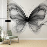 Modern Black Butterfly Wallpaper creating dramatic impact in a minimalist living room with white furniture