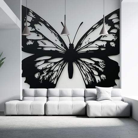 Modern black butterfly wallpaper mural creating drama in a bright living room with minimal furniture