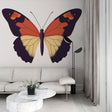 Modern Orange and Gold Butterfly Mural Wallpaper styled in a bright contemporary living room with minimal furniture