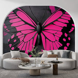 Modern pink butterfly wallpaper creating dramatic impact in a minimalist living room with black accents