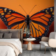 Monarch butterfly wallpaper creating a stunning focal point in a bright modern living room with neutral furniture