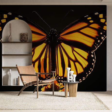 Butterfly wall mural in modern living room showing dramatic Monarch wings creating warm, golden atmosphere