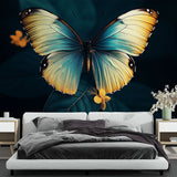 Butterfly wall mural with turquoise and gold wings creating a stunning focal point in a bright modern living room