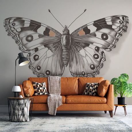 Butterfly wall mural creating an elegant focal point in a modern living room with minimalist furniture