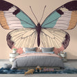 Butterfly wall mural in soft pastel tones creating an elegant focal point in a bright modern living room setting