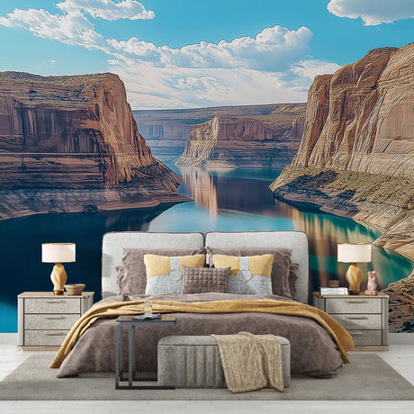 Canyon landscape wallpaper creating depth in a modern living room with natural light and minimal furniture