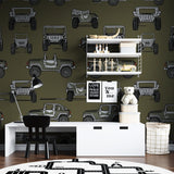 Military vehicle wallpaper creating focal point in boy's study space