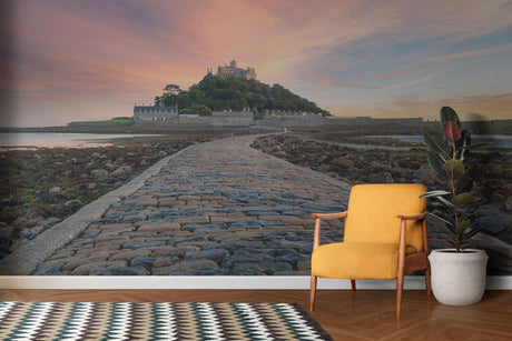 Castle wall mural creating a magical atmosphere in a modern living room with soft sunset lighting
