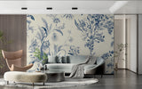 Cat and floral wallpaper displayed in cozy bedroom, showing blue and white botanical details